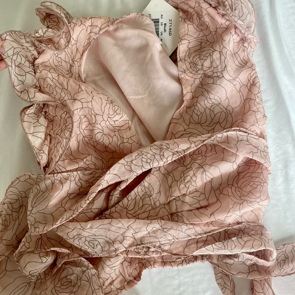 Pink floral wrap top